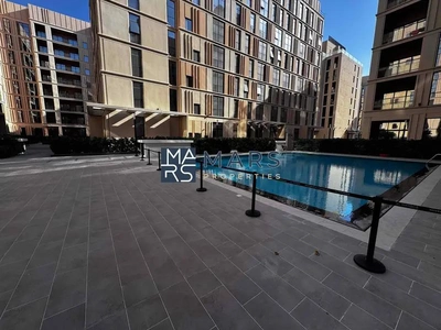 Spacious one bedroom with kitchen appliances in modern community-0