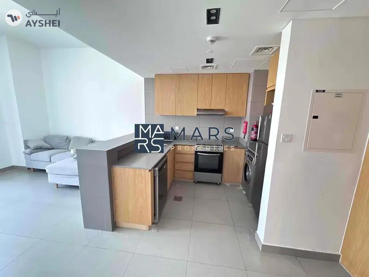 Spacious one bedroom with kitchen appliances in modern community-5-5