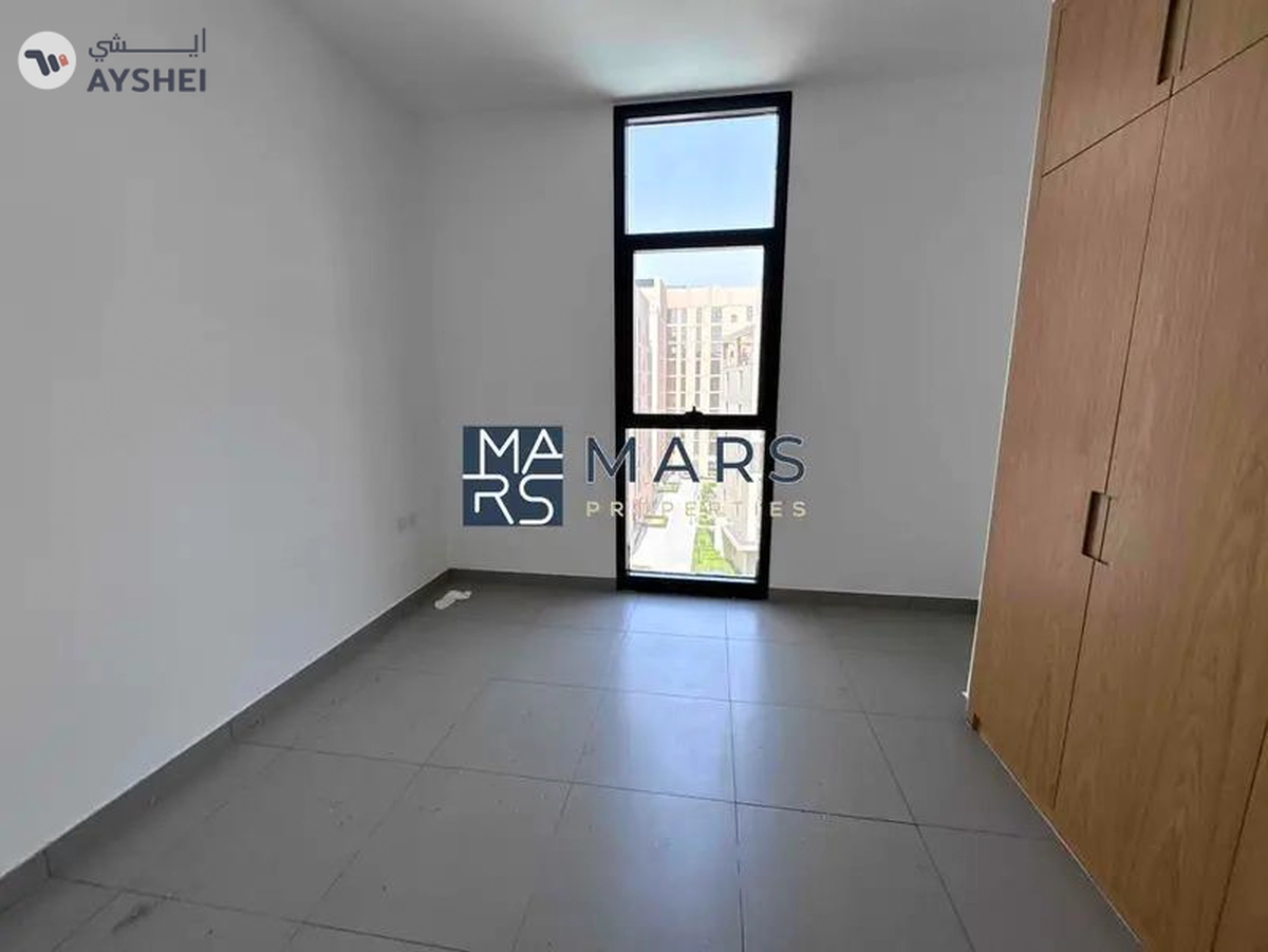 Spacious one bedroom with kitchen appliances in modern community-7-7