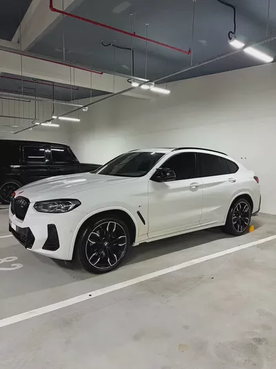 Pristine 2023 BMW X4 M40i | GCC Specs | Low Mileage | Warranty & Service-0