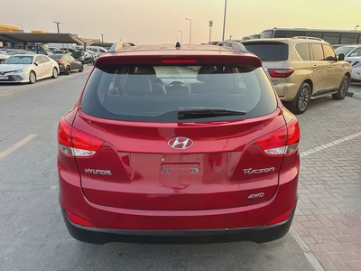 Hyundai tucson 2013 red color GCC calen car-4