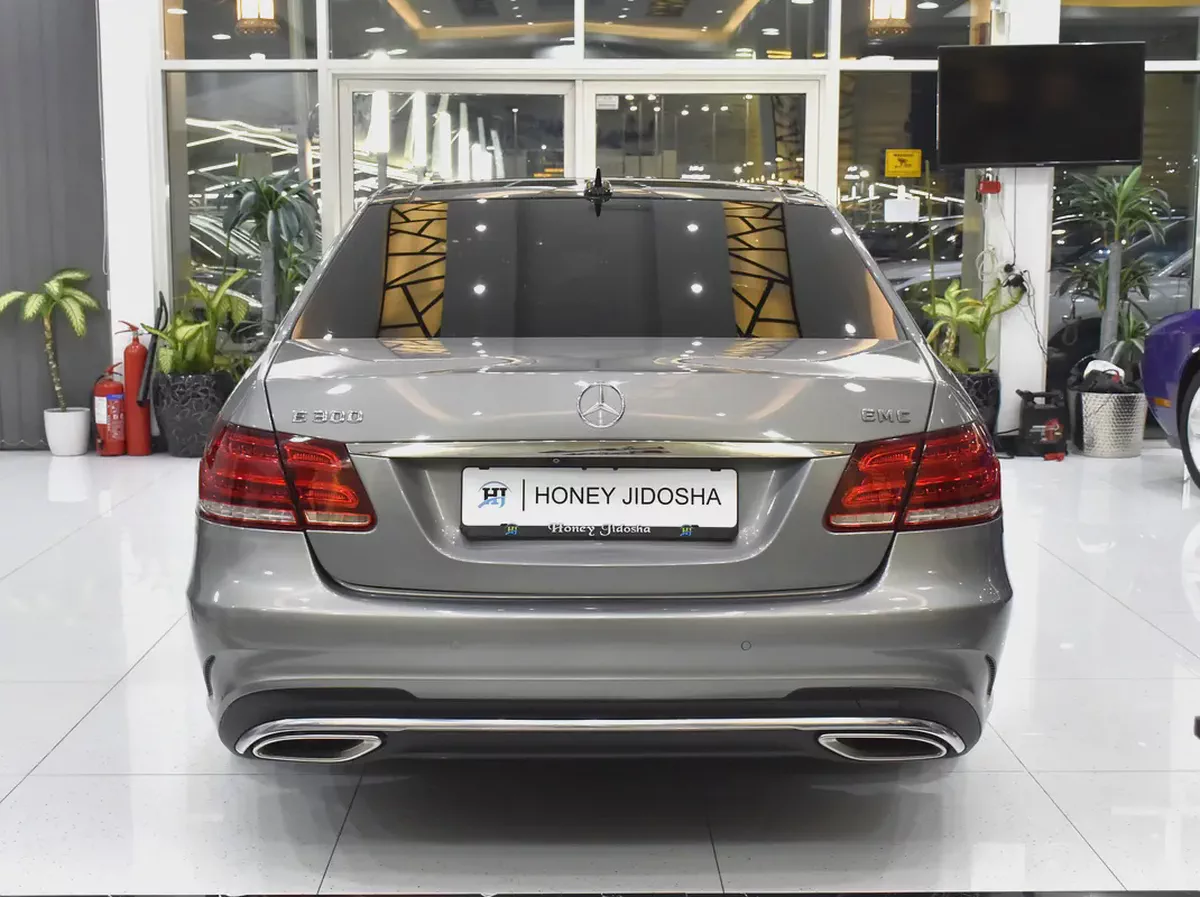 EXCELLENT DEAL for our Mercedes Benz E300 ( 2015 Model ) in Grey Color GCC Specs-4-4