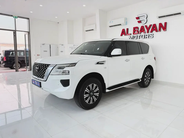 نيسان باترول LE 400 محول من داخل فل اوبشن  ابيض / زعفراني 2020 خليجي