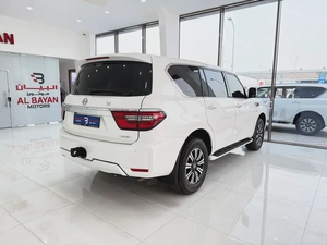 نيسان باترول LE 400 محول من داخل فل اوبشن  ابيض / زعفراني 2020 خليجي