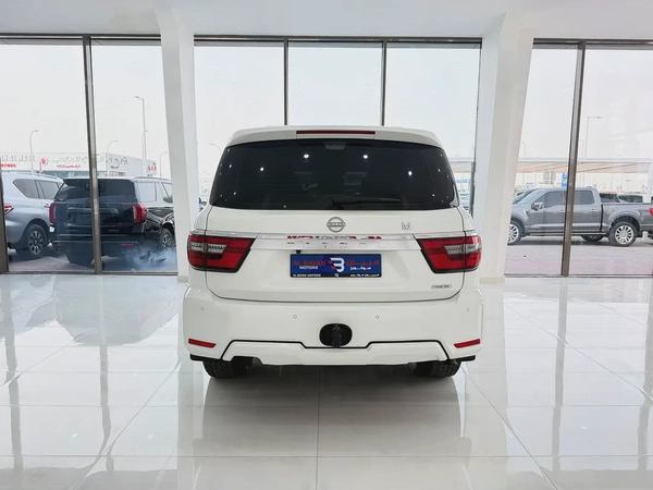 نيسان باترول LE 400 محول من داخل فل اوبشن  ابيض / زعفراني 2020 خليجي