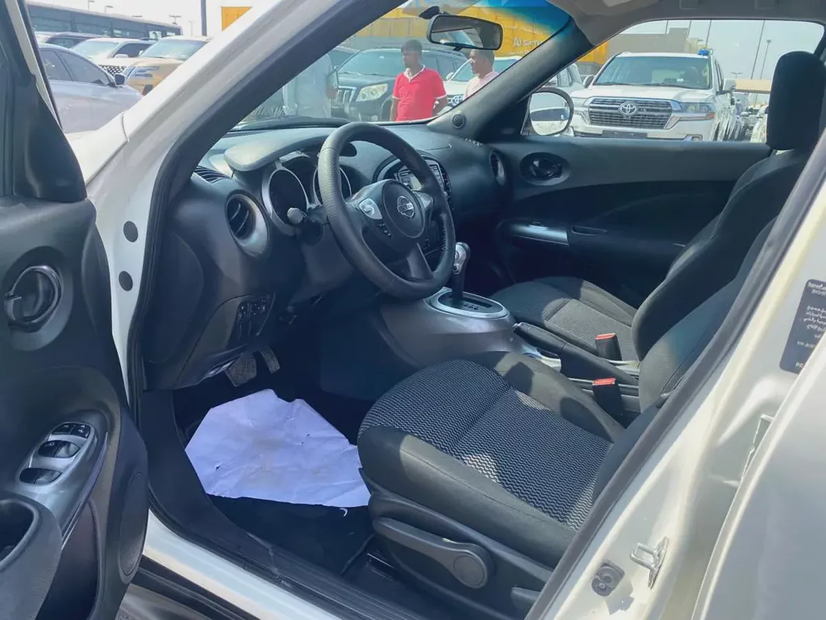 Nissan juke 2015 white color GCC calen car-14-14
