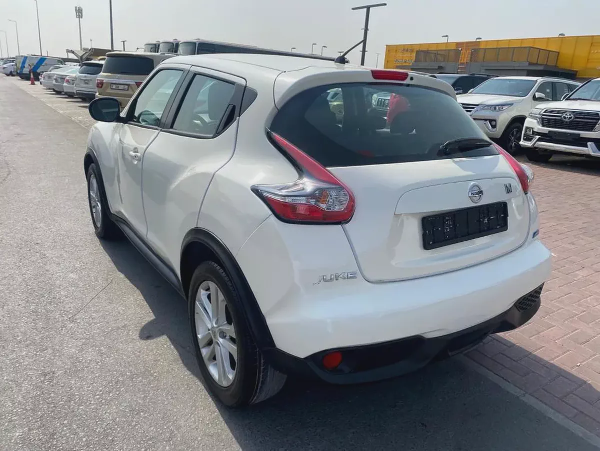 Nissan juke 2015 white color GCC calen car-6-6