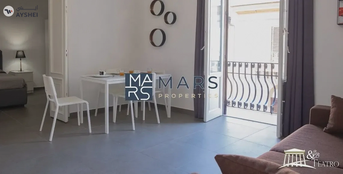 "Indulge in Luxury at Your Elegant Home: One-Bedroom Apartment in il teatro 1 Building, Sharjah"