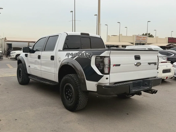 Ford Raptor, 2013 white, 4 doors