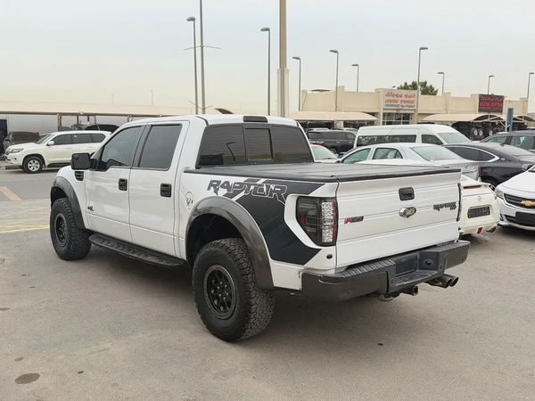 Ford Raptor, 2013 white, 4 doors