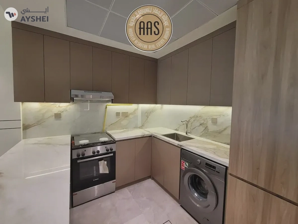 Brand new 1bhk lavish with kitchen appliances//rent85k//huge balcony//all amenities arjan dubai