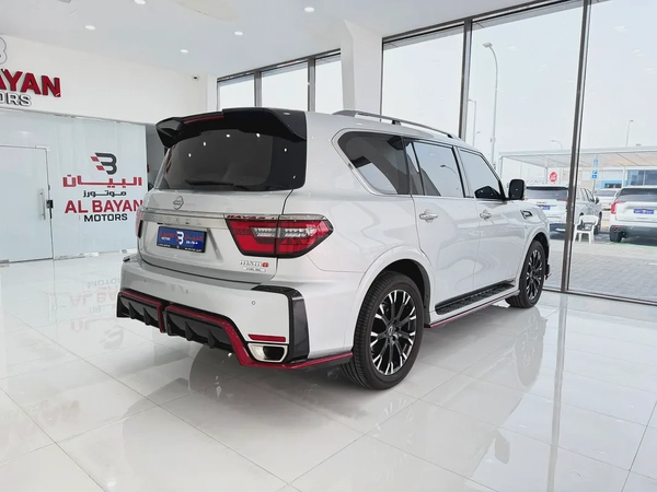 نيسان باترول نيسمو فضي / احمر خليجي المسعود Nissan Patrol NISMO 2022 GCC Specs Pristine Condition