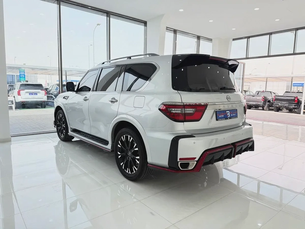 نيسان باترول نيسمو فضي / احمر خليجي المسعود Nissan Patrol NISMO 2022 GCC Specs Pristine Condition