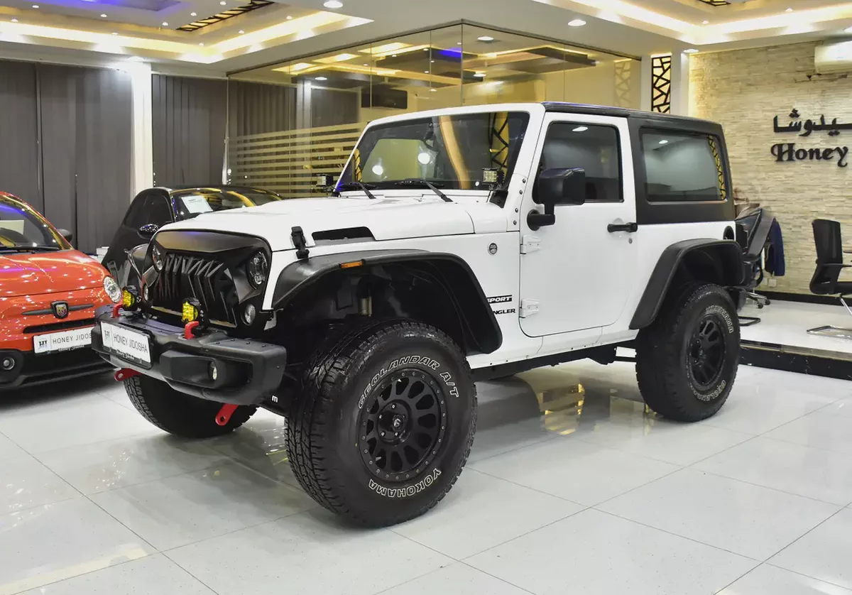 EXCELLENT DEAL for our Jeep Wrangler Sport ( 2017 Model ) in White Color GCC Specs-1-1