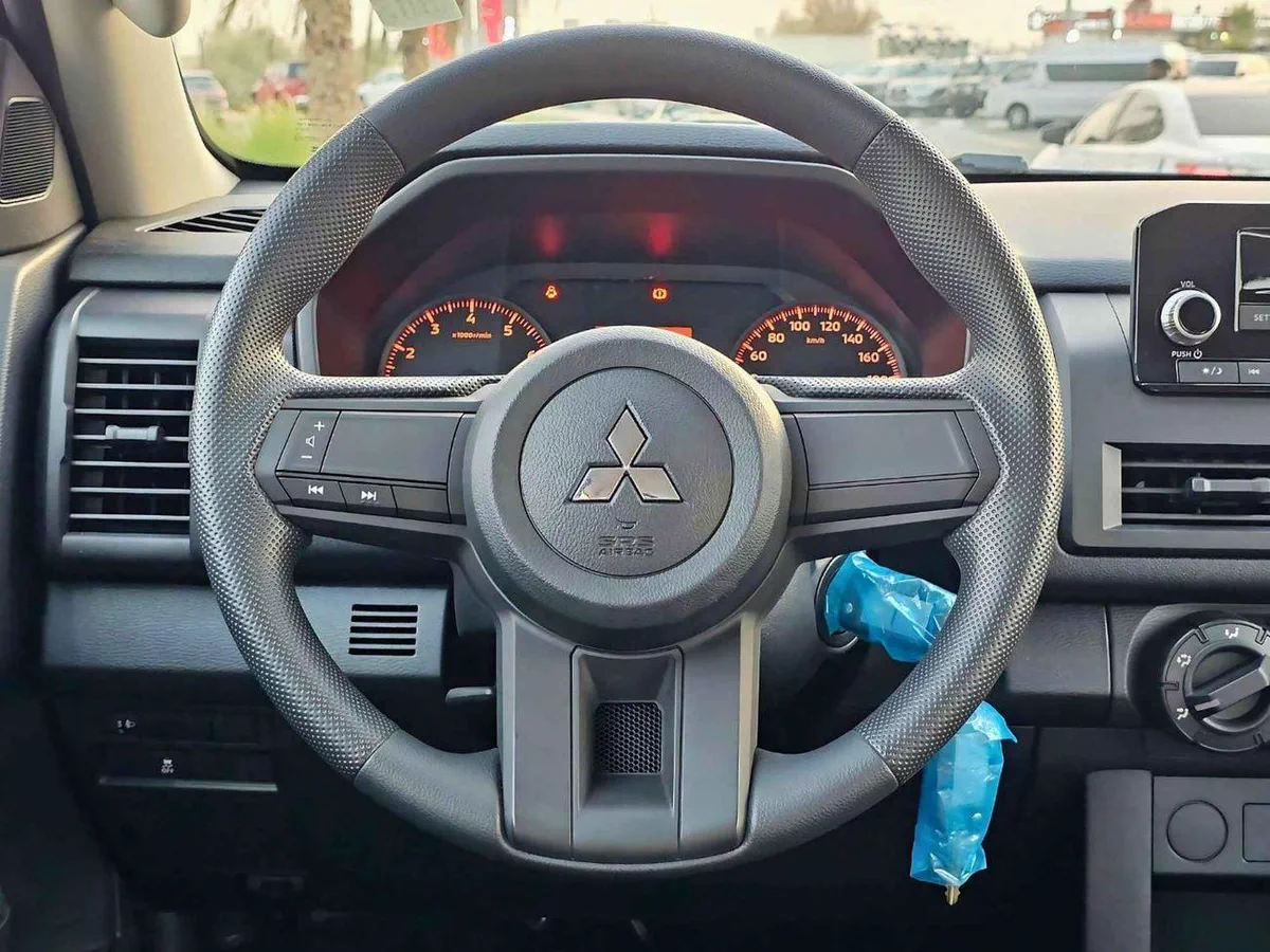 Mitsubishi L200 GLX || 2.4L PETROL M/T 4WD | SIDE STICKER (CODE # GLXP)-11-0