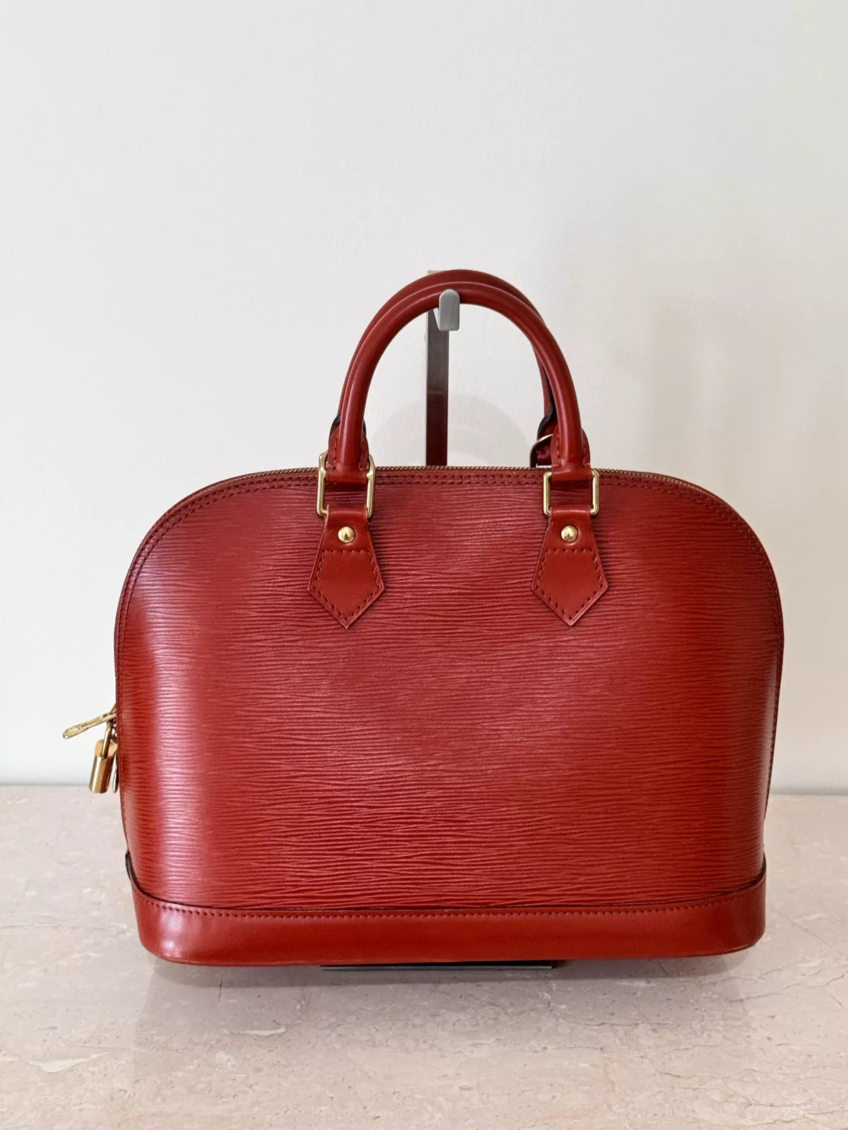 LOUIS VUITTON Alma Epi Bag