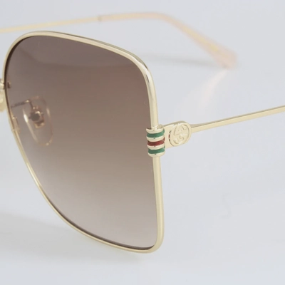 Gucci GG1282SA-003 Sunglass for Women - Gold Brown-1