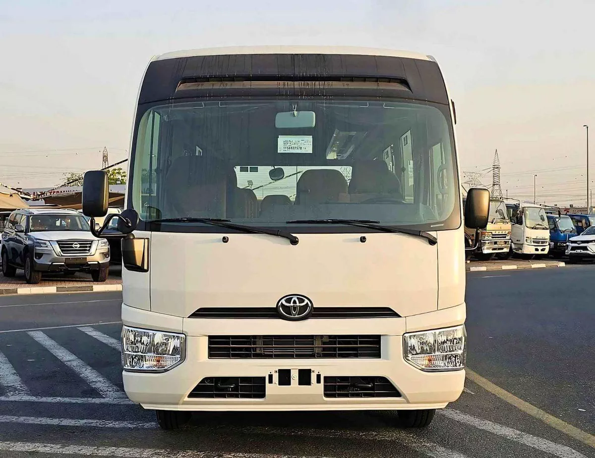 Toyota Coaster 4.0L V4 DIESEL 23 STR M/T || AUTO DOOR | BAGGAGE TRAY WITH RACK (CODE # COD4J)