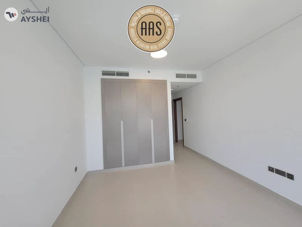 First tenant/ brand new 2bhk apartment with balcony & fitted cabinet in 105k AED
