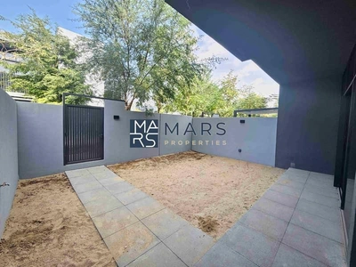"Stunning 4-Bedroom Middle Unit Townhouse in Masaar – For rent-0