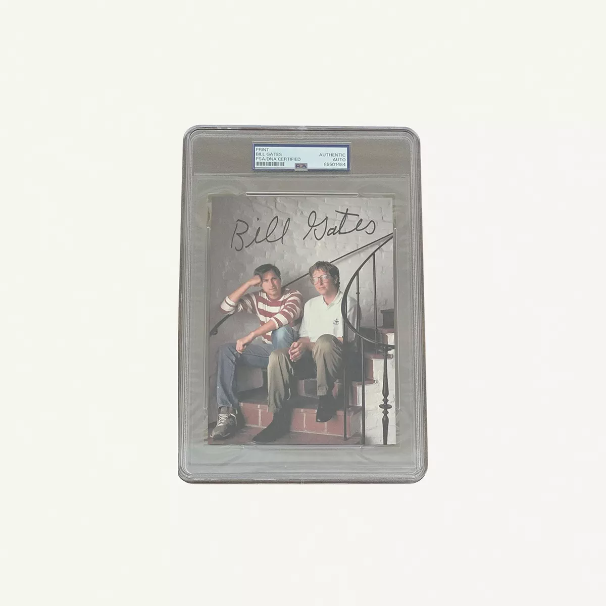 An authentic Bill Gates autographed photographic print featuring Bill Gates and Steve Jobs, certified by PSA/DNA.-0-0