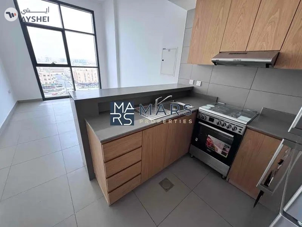 Spacious one bedroom apartment with kitchen appliances and all facilities available in Al Mamsha