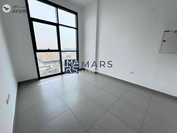 Spacious one bedroom apartment with kitchen appliances and all facilities available in Al Mamsha