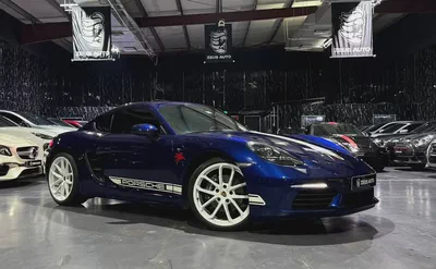2024 718 Porsche Cayman | Style Edition |GCC | Low Mileage | Gentian Blue Metallic Exterior-2