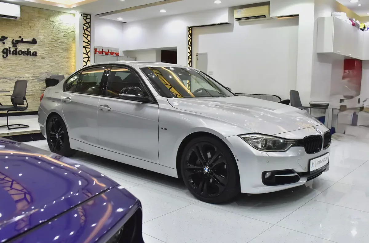 EXCELLENT DEAL for our BMW 335i Sport ( 2013 Model ) in Silver Color GCC Specs-2-2