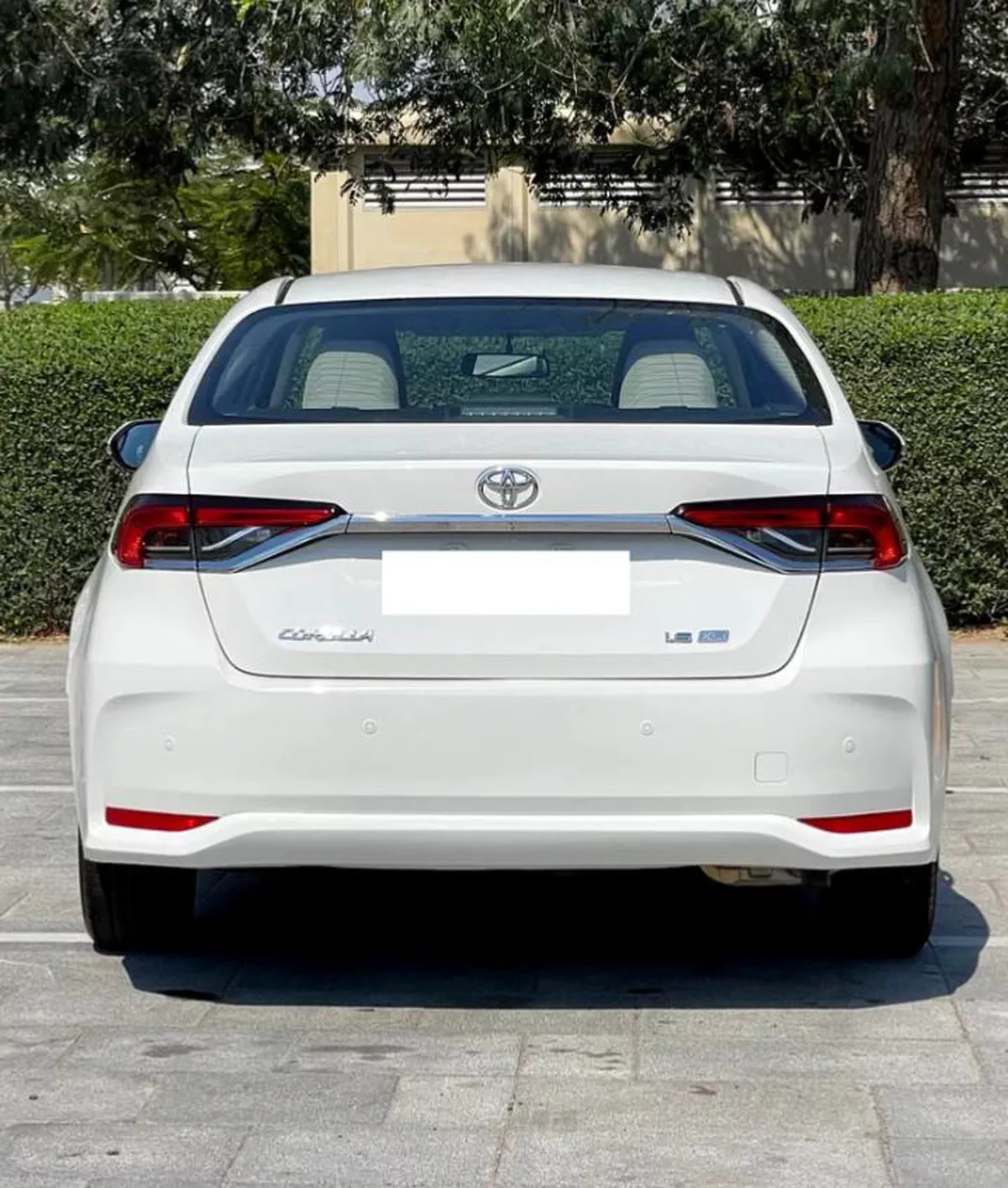 White Toyota Corolla Sedan-4-4
