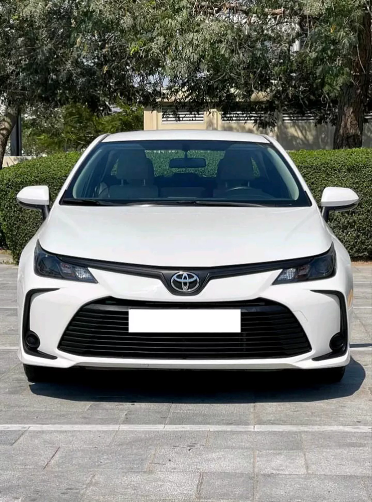 White Toyota Corolla Sedan