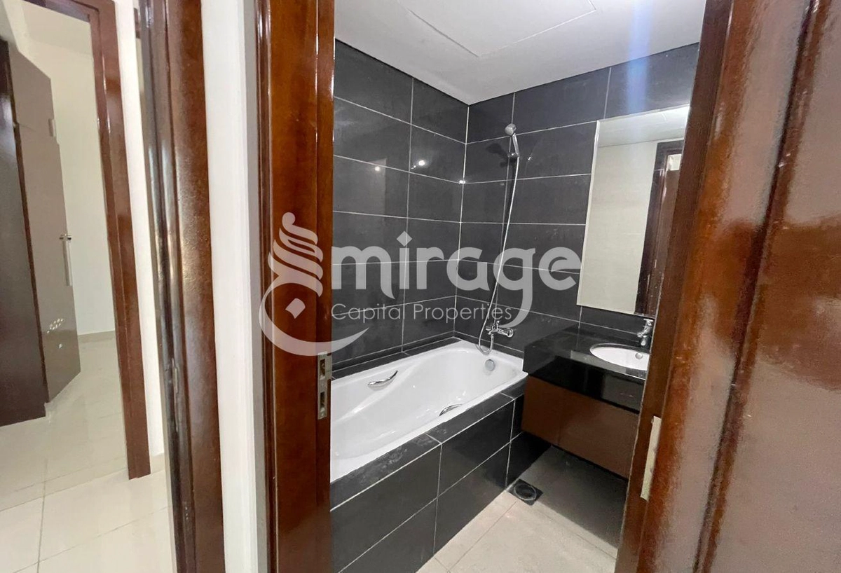 Spacious 1BR APT | Partial Sea View | Prime Area