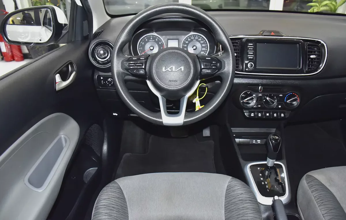 AED 654 EMi at 0% DP | KIA Pegas ( 2024 Model ) in White Color GCC Specs-10-10