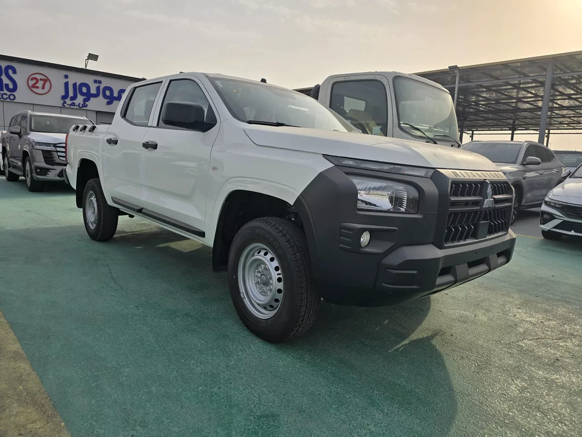 MITSUBISHI L200 DC MANUAL 4X4-14-14